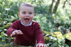 UK royals publish photos of Prince Louis to mark first birthday