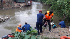 Young busker found dead in Depok river