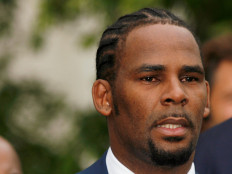 R. Kelly's accuser wins judgment in suit singer failed to answer