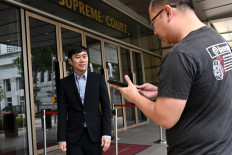 Singapore activist fined for Facebook post on courts