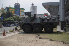 A military vehicle is seen parked in Glodok after arriving the night before the election. JP/Rosa Panggabean