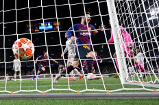 Messi double downs Liverpool