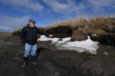 Alaska's thaw threatens prehistoric sites once frozen in time