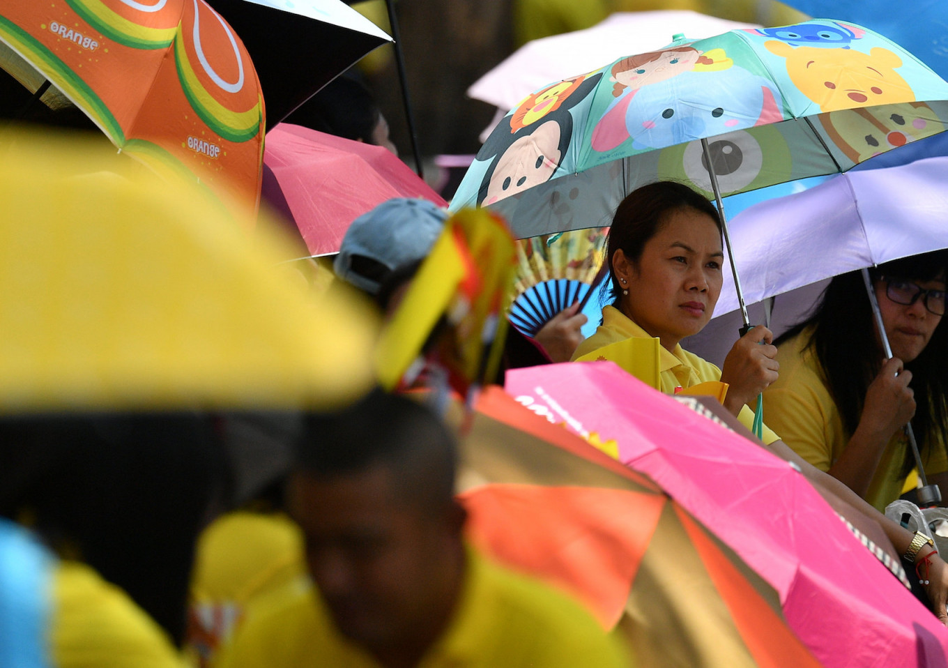 People wait to pass through a security check before attending a coronation procession for Thailand's newly crowned King Maha Vajiralongkorn in Bangkok
People wait to pass through a security check before attending a coronation procession for Thailand's newly crowned King Maha Vajiralongkorn in Bangkok, Thailand May 5. 