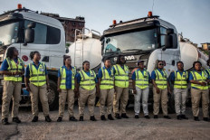Female lorry drivers change gears in Ghana