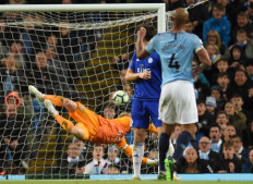 Goal hero Kompany makes good on promise as Man City go top again