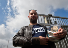 Francesco Polacchi, founder of the Altaforte publishing house, who defines himself openly as a fascist, presents books to the media outside the gates of the International Book Fair in Turin, Italy, on May 9, 2019. 