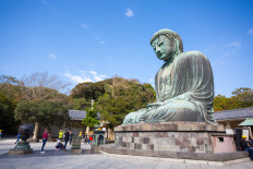 Monumental bronze statue of the Great Buddha in Kamakura, Japan. 