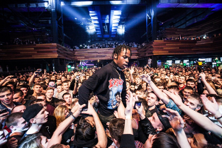 Travis Scott performing live music show concert on night club stage in Moscow, Russia on Dec. 6, 2014.