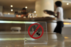 A no-smoking sign is seen in a cafe-restaurant, in Athens on September 1, 2010. 