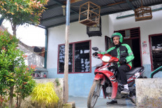 COVID-19: Govt to give Rp 5m aid to shops, 'ojol' drivers as business slows down