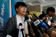 Hong Kong democracy leader Joshua Wong sent back to jail