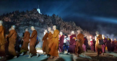 Buddhist monks repeat mantras and meditate as they walk around Borobudur temple in Central Java clockwise three times as part of the Pradaksina ritual in the early hours on Sunday. JP/ R Berto Wedhatama