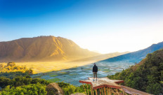 Breathtaking view:  A traveler takes in the view of farmland at Sembalun near Rinjani volcano in Lombok, Indonesia.