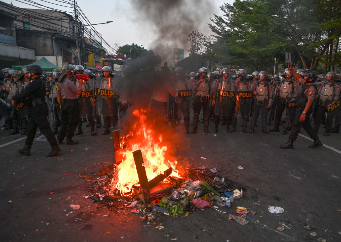 Jakarta riot Police detain at least 20