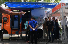 Jakarta riot: Bank Indonesia temporary stops mobile banknote-exchange service