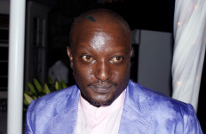 Kenyan writer Binyavanga Wainaina, who challenged stereotypes of Africa with biting satire and took on prejudice by documenting his life as an openly gay man, is seen at his an event in Nairobi, Kenya in this picture taken September 4, 2014.