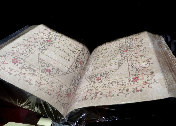 Golden letters: A Quran written in gold ink believed to date back to the 13th century.  