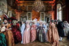 Period costume ball brings France's Sun King back to life in Versailles