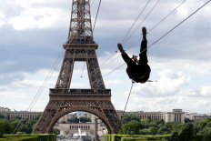Eiffel Tower becomes launch pad for zip-line attraction