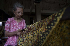 Mbah(grandma) Suti is a 69-year-old batik artist who has been creating batik since 1969.  JP/Sigit Pamungkas