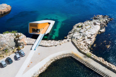 Descend, eat, marvel: Europe's first underwater restaurant
