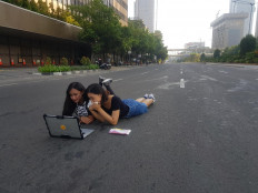 Shutterbugs descend on 'quiet Jakarta' over Idul Fitri