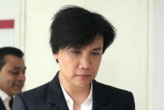 Singapore lawyer charged with assault, harassment following leaked video