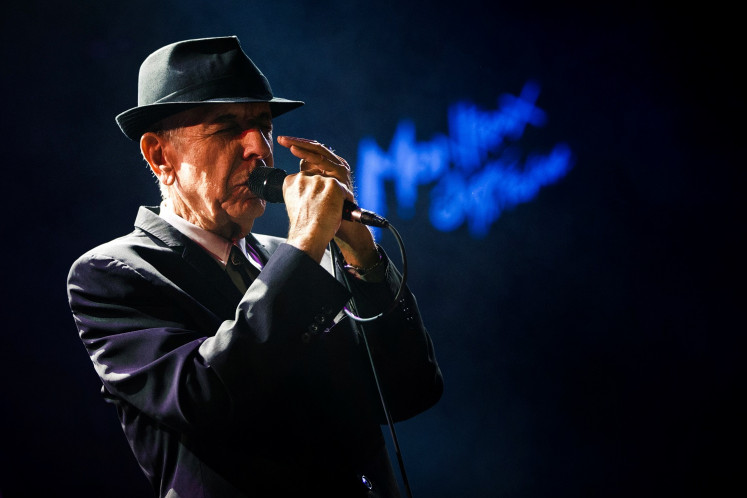Canadian singer-songwriter Leonard Cohen performs during the first night of the 47th Montreux Jazz Festival in Montreux, Switzerland on July 4, 2013. 