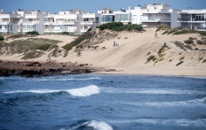 This picture shows a general view of the beach in the city of Mohammedia on May 22, 2019. A report from the United Nations Environment Program (UNEP) on the overexploitation of sand in the world points out the role of 'sand mafias' in the loss of Moroccan beaches, amidst coastal urbanization.