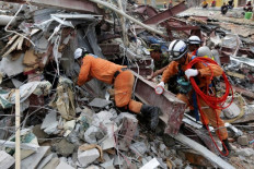 Rescuers scour rubble as Cambodia building collapse toll rises to 18