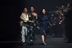 Singers Solange and Lisa star in Paris fashion week's finale