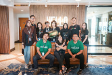 The GoWork team welcomes Go-Jek to GoWork Senayan City