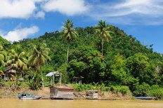 A Dayak village is seen on the banks of the Kayan River, East Kalimantan, in this file photo.