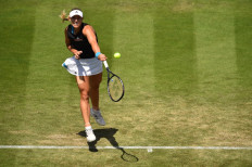 Kerber outguns Halep to reach Eastbourne semi-finals