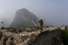 Mules, tools and old bricks: Rebuilding China's Great Wall