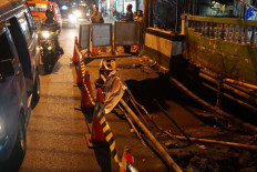 Age-decayed structure blamed for partial collapse of bridge in Depok