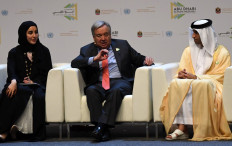 UN Secretary General Antonio Guterres (C), UAE Minister of State for Youth Affairs Shamma al-Mazrui (L) and UAE minister of climate change Thani al-Zeyoudi (R) chair a pannel during the opening of the Abu Dhabi climate meeting Summit on June 30, 2019 in Abu Dhabi.