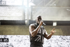 British rapper Stormzy performs the headline slot on the Pyramid stage during Glastonbury Festival in Somerset, Britain, on June 28, 2019. 