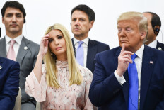 In this file photo taken on June 29, 2019 US President Donald Trump (R) and advisor to the President Ivanka Trump (L) attend an event on women's empowerment during the G20 Summit in Osaka. Ivanka Trump got a ribbing back home on July 1, 2019 after critics took issue with the prominent role played by President Donald Trump's daughter during summits in Japan and South Korea. Ivanka Trump's official capacity is advisor to the president and she is a constant presence in the White House.
