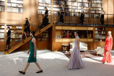 Lagerfeld successor brings demure librarians to Chanel catwalk