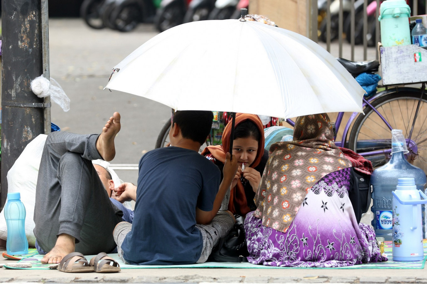 Asylum Seekers Refuse To Move From Central Jakarta Sidewalks - City ...