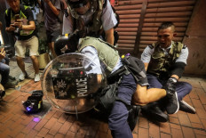 Hong Kong police arrest five after new night of clashes