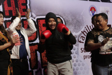 Boxer Chris John fights sports minister, East Nusa Tenggara governor