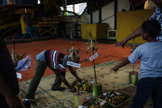 Each division in the Madukismo factory prepares offerings for the ritual. JP/Anggertimur Lanang Tinarbuko