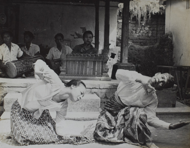 Protege: Hazel Chung (left) had the opportunity to study under some of the island's most illustrious dancers. Here she is pictured learning the 