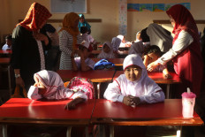 Parents heave sighs of relief on first day of school after enrollment woes