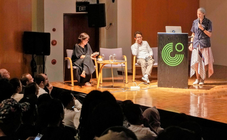 Explanatory: (From left) documenta International Finding Committee member Ute Meta Bauer, ruangrupa art collective member Mirwan Andan and documenta director general Sabine Schormann speak during a presentation at Goethe Haus, Jakarta.