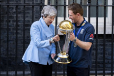England celebrate World Cup triumph with young fans