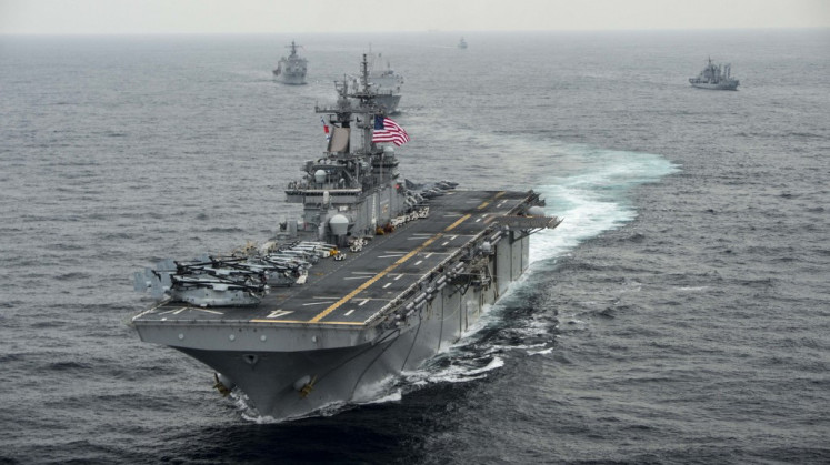 This US Navy file photo taken on March 7, 2016 shows the amphibious assault ship USS Boxer (LHD 4) as it transits the East Sea during Exercise Ssang Yong 2016. The US military shot down an Iranian drone on July 18, 2019 that came within 1,000 yards of one of its naval vessels in the Strait of Hormuz, President Donald Trump said.